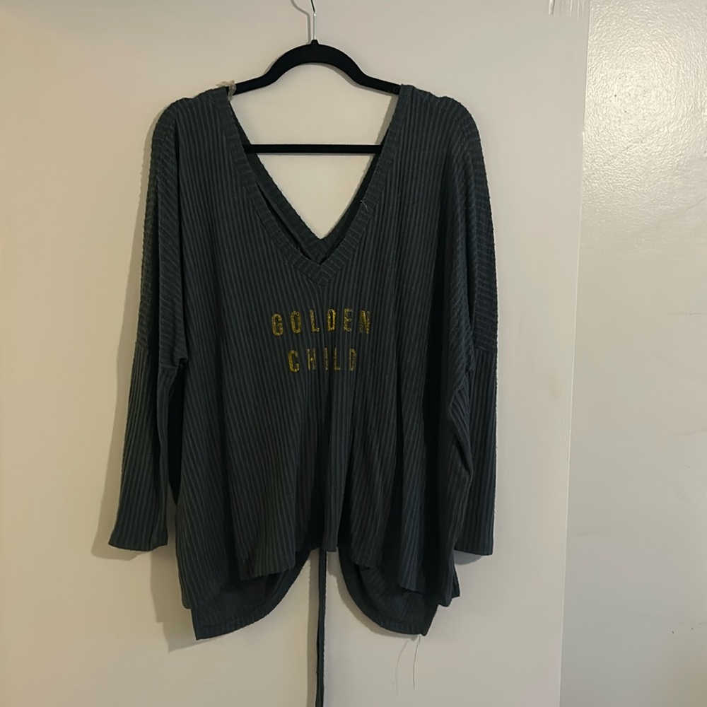 Long sleeve thermal. Dark teal, size large. V-neck. “Golden Child”
